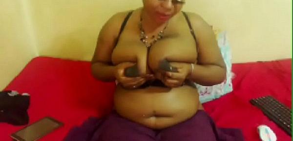  Sexy african woman with huge tits milk